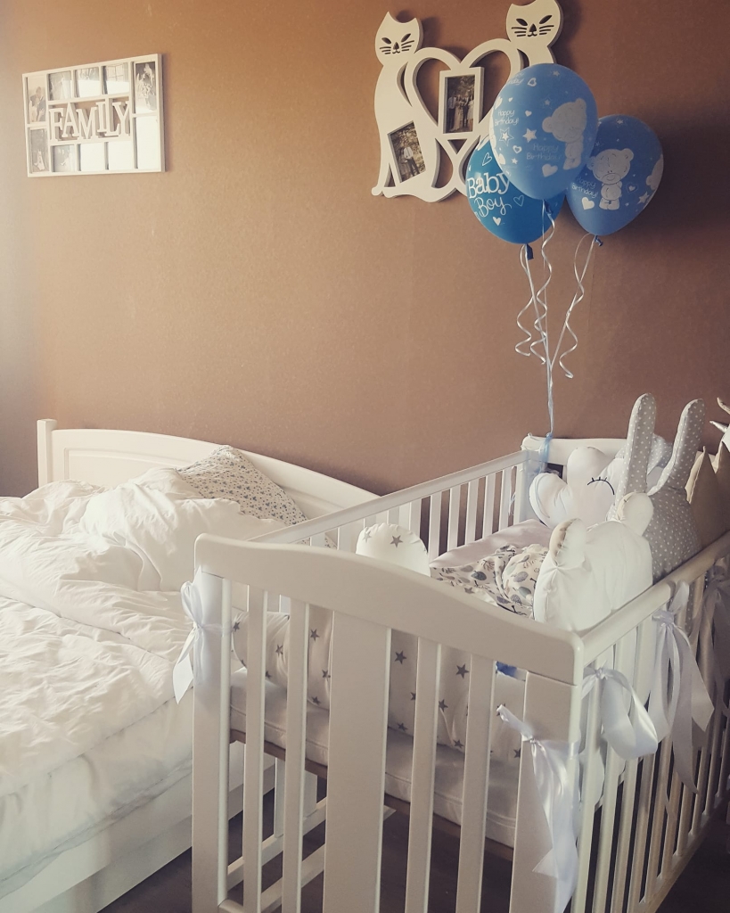 baby cot and dresser